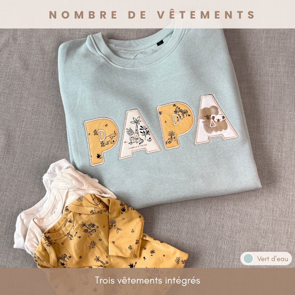 Sweat souvenir personnalisé homme col rond vert d'eau brodé « PAPA » motif savane, trois vêtements de bébé intégrés dans la broderie